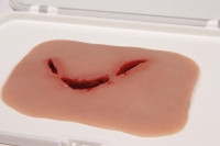 Wundmoulage Schnittwunde Flasche